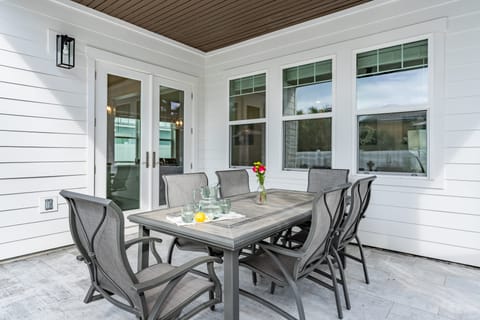 Outdoor dining area on the covered back patio.