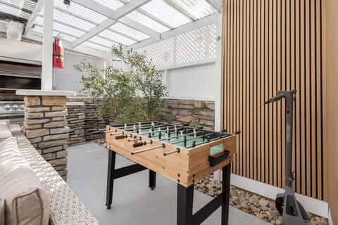 Bring the fun indoors – challenge your friends to a game of foosball!