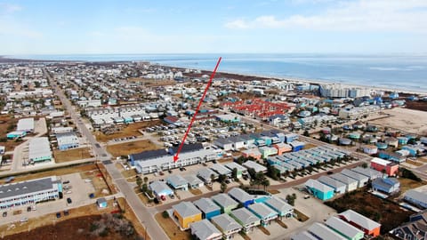 Get a bird’s-eye view of the neighborhood, with an arrow highlighting the perfect spot where your getaway awaits.