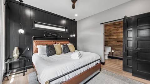 Bedroom 1 features a king bed and an ensuite bath.