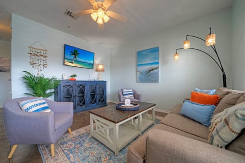 Coastal-inspired décor, plush seating, and a sleeper sofa.