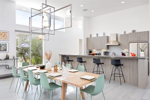 Stunning interior design, a chic dining area, and chef's kitchen. (Polo Villa 8)