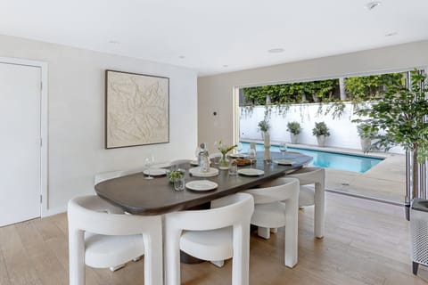 Enjoy the best of indoor-outdoor living with large doors that open directly from the dining area to the pool.
