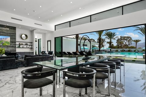 Grand great room with soaring ceilings and seamless indoor-outdoor flow.