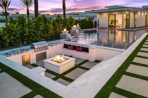 Sunken firepit and BBQ grill.