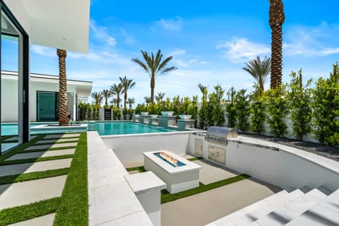 Firepit and BBQ grill area.