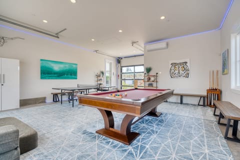 Game room with a pool table, ping pong, and more!
