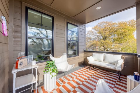 Outdoor living on the covered balcony. (The Stage)