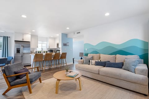 Primary bedroom features a king bed and ensuite bathroom.