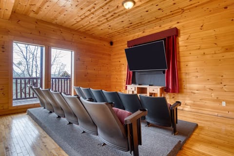 Enjoy movie nights in the cozy theater room with a big-screen experience!