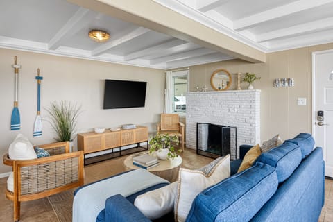Light-filled lounge with cozy seating.