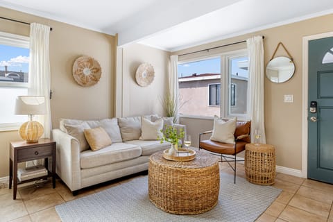 Bright and airy living space with comfortable seating.