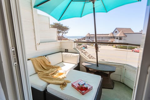 Relax in the shaded seating area on the balcony.