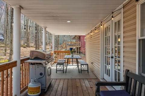 Enjoy outdoor grilling and relaxation on the front porch.