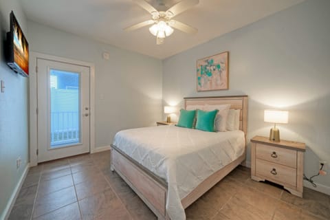 Bedroom 2 features a queen bed and an ensuite bathroom (Unit 102)