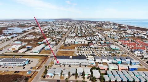 Get a bird’s-eye view of the neighborhood, with an arrow highlighting the perfect spot where your getaway awaits.