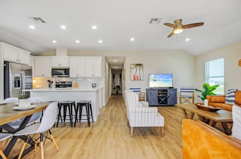 Embrace coastal vibes in this beach-inspired living space. (Surf N Dipity)