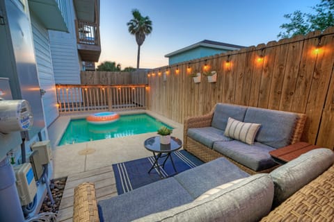 Private pool and outdoor lounging area. (Shore Thang)