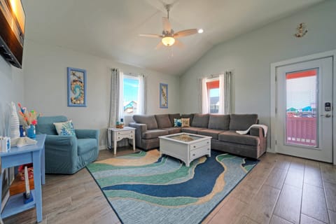 Living room with sleeper sofa. (Sandy Feet Retreat)