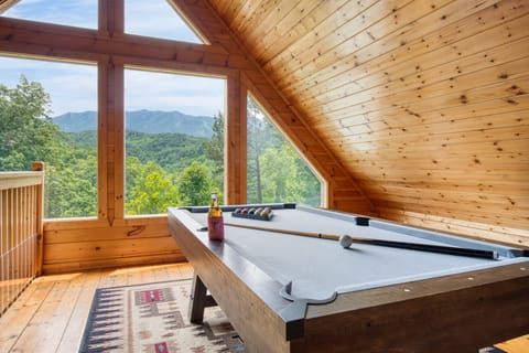 Pool table with mountain view.