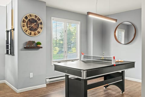 Ping pong table for friendly matches and indoor fun.