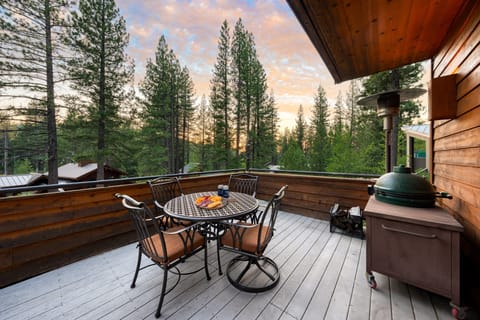 Outdoor dining with forest views