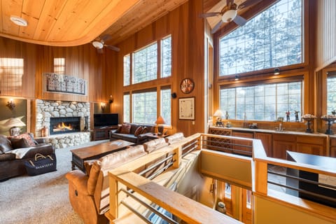 Open-concept living room with large windows