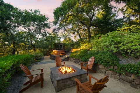 Patio seating with a fire pit.