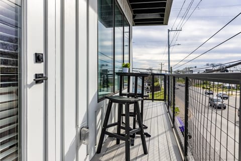 Unit 405 bedroom 2 features two queen beds