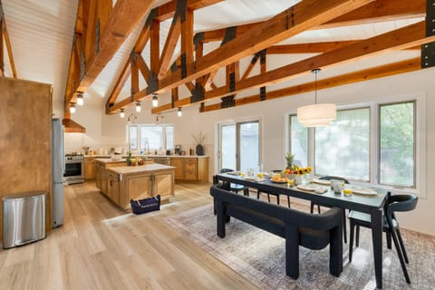 Beautiful open-concept living space with a modern cabin feel.