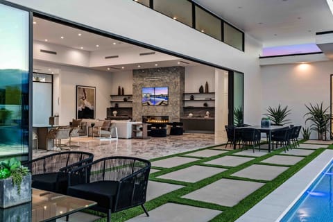 Seamless flow from the living room to the outdoor terrace. (Villa 14)