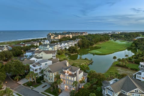Aerial view of the home’s prime location near water & golf.