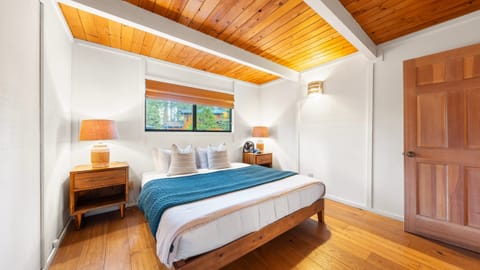 The primary bedroom features a king bed. Located downstairs.