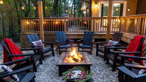 Our outdoor firepit area features ample seating, creating the ideal spot for unforgettable gatherings and relaxation.