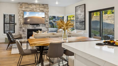 Open concept, natural light, and a stone fireplace. Perfect for entertaining.