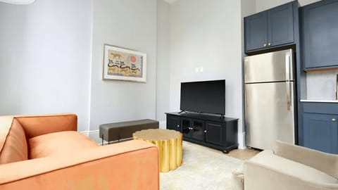 The open-concept living area offers seamless transitions between the living and kitchen areas.