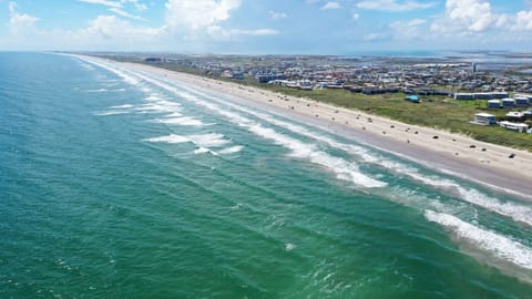 Sun-kissed sands and soothing waves.