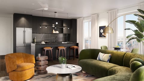 Deluxe 2 Bedroom Suite w/ Balcony: Living room with modern appliances.