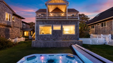 Evening perfection. Enjoy a relaxing soak in the hot tub with the beautiful sunset hues as your backdrop.