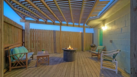 Gather under the covered patio for grilling, fireside chats, and laid-back evenings.