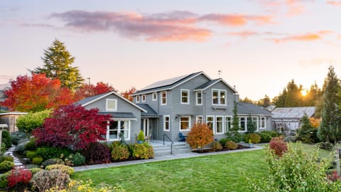 Exterior of the house with garden view.