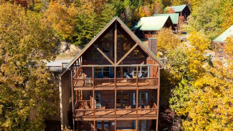 Spacious multi-level cabin with expansive decks and stunning Smoky Mountain views from every floor.