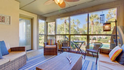 Enjoy views of the pool from the enclosed patio! (405 Yacht)