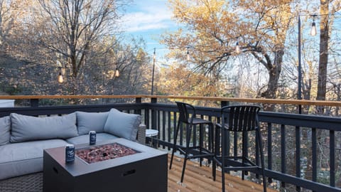 Sip coffee or unwind by the firepit while surrounded by the peaceful forest canopy.