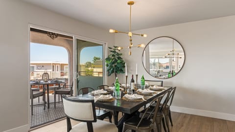 Elegant dining area with easy access to the balcony. (Unit 1)