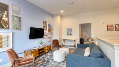 Blue sofa vibes for deep talks and music marathons. (A101, A103)