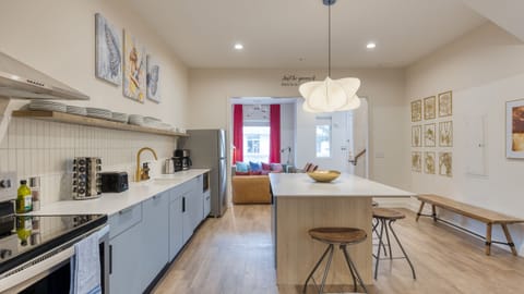 Share late-night laughs around the stylish kitchen island. (A101, A103)