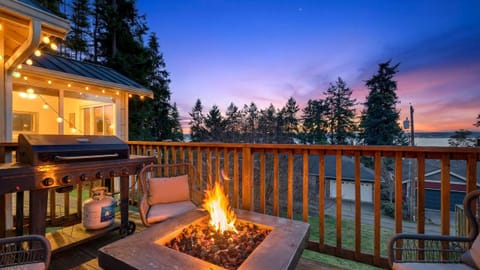Cozy up by the custom firepit on the deck while the sunsets over the horizon.