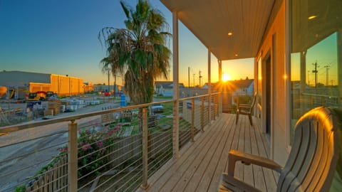 Enjoy tranquil sunset views from the balcony.
