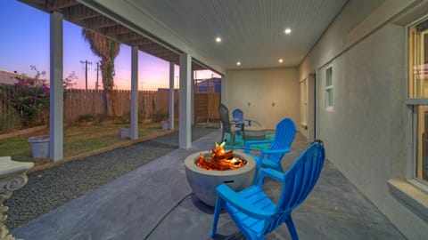 Stay warm by the fire pit on the patio.